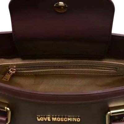 THE DANGLING HANDBAG